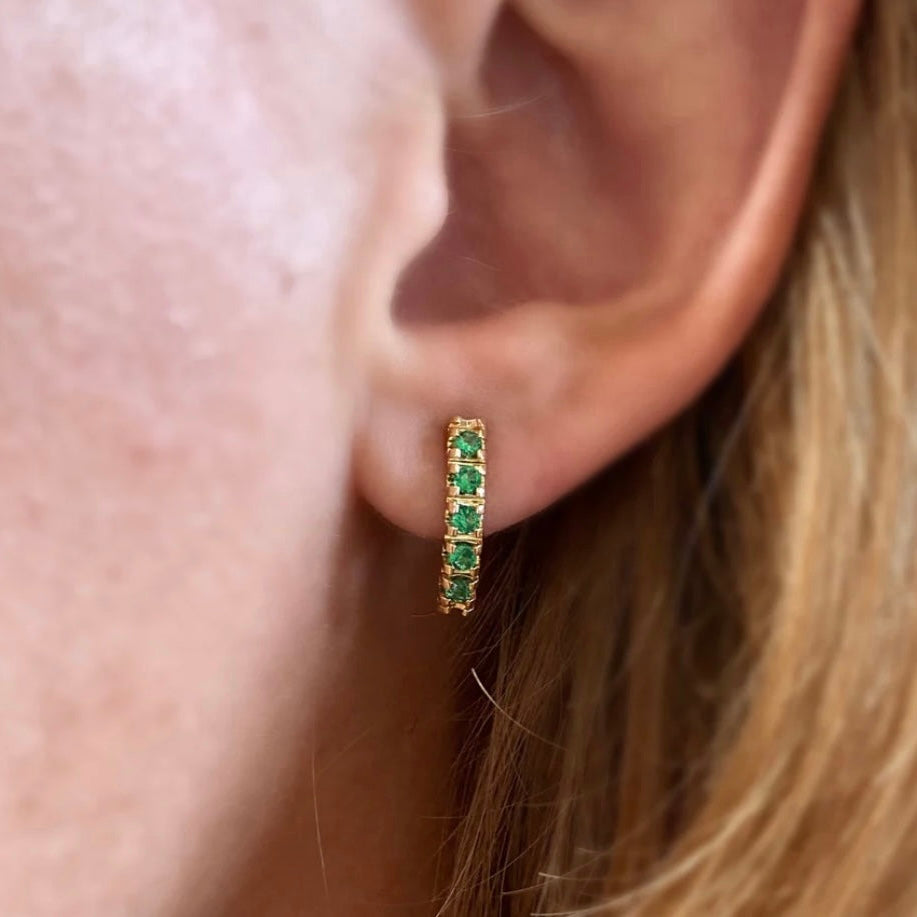 curved emerald stud